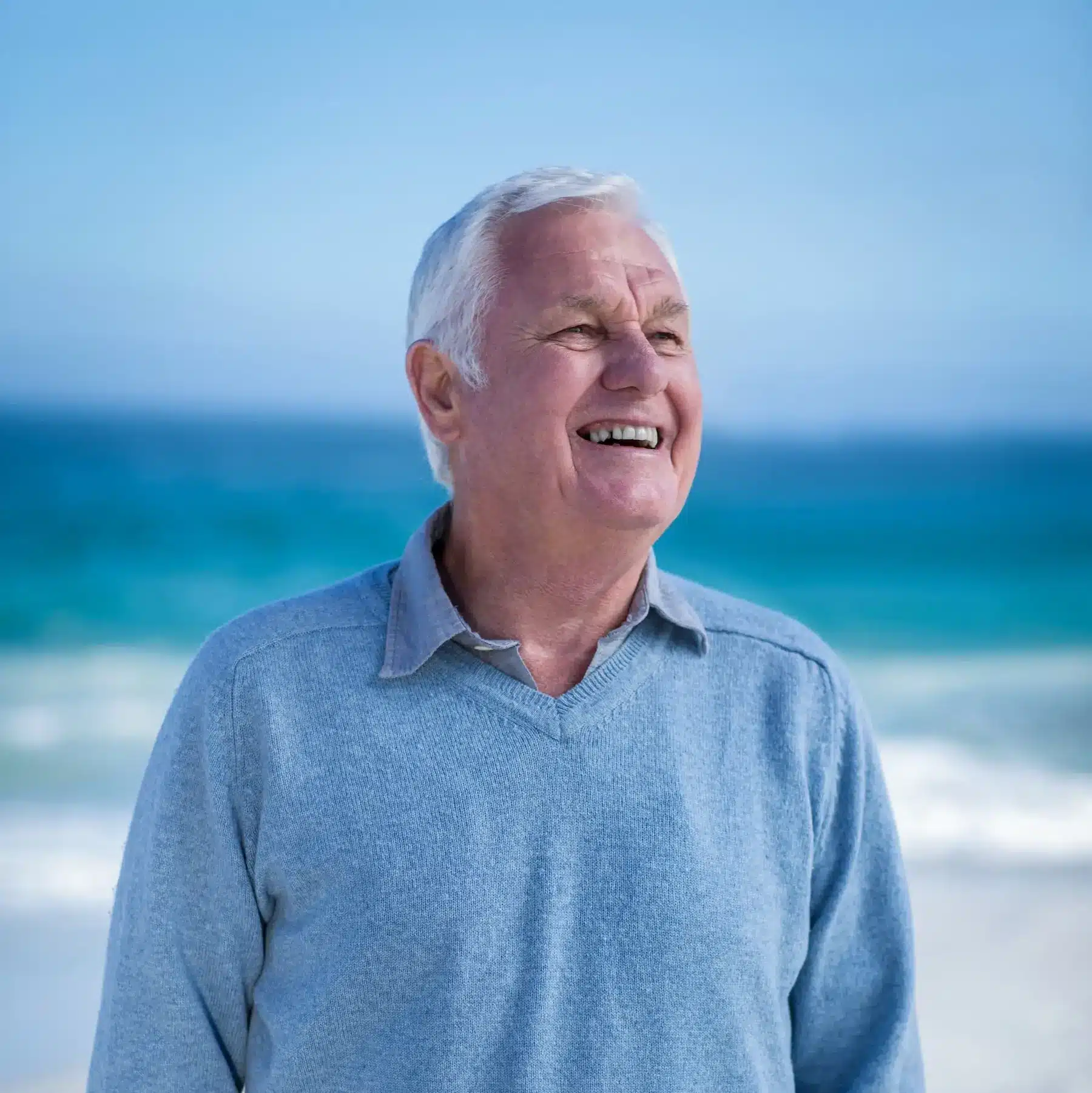 Guide to cataract surgery: Everything you need to know 1 senior man smiling and looking away edited